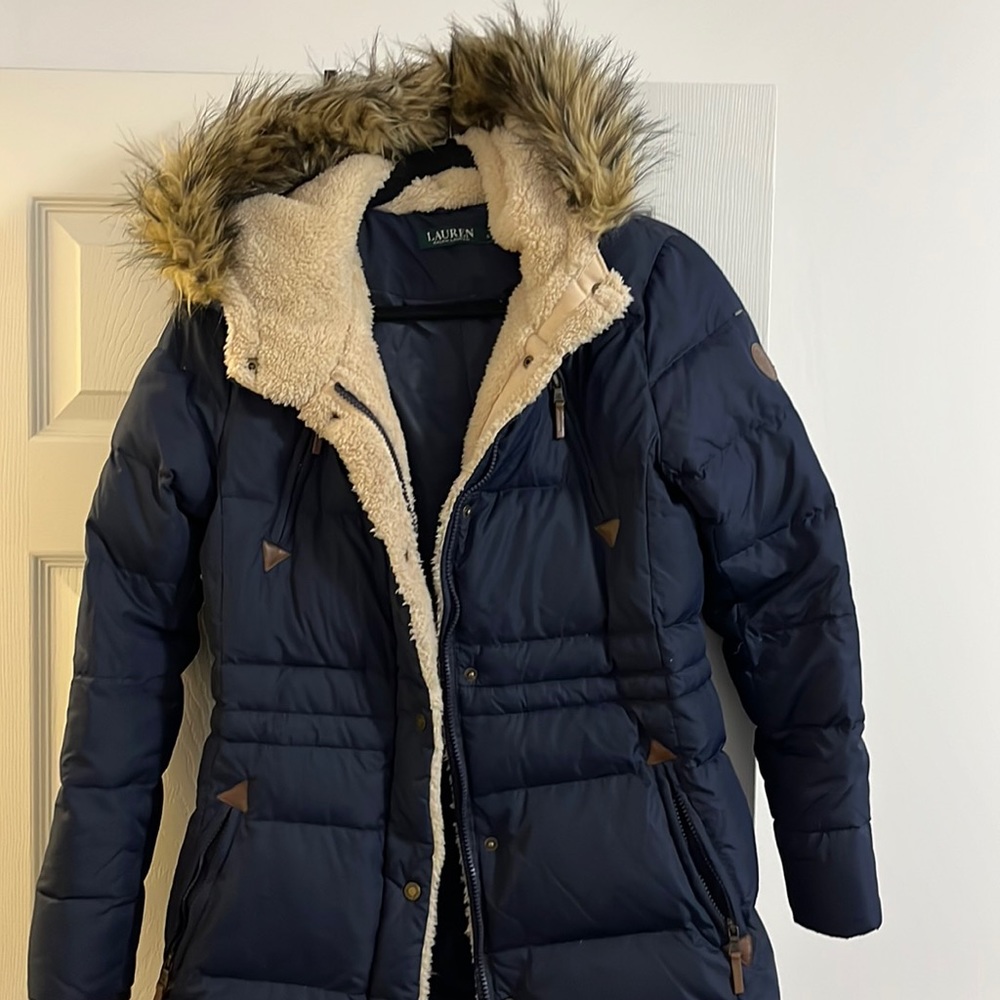 Jacket, furry hoody , adjustable , lots of pockets, very cozy , lightly worn
